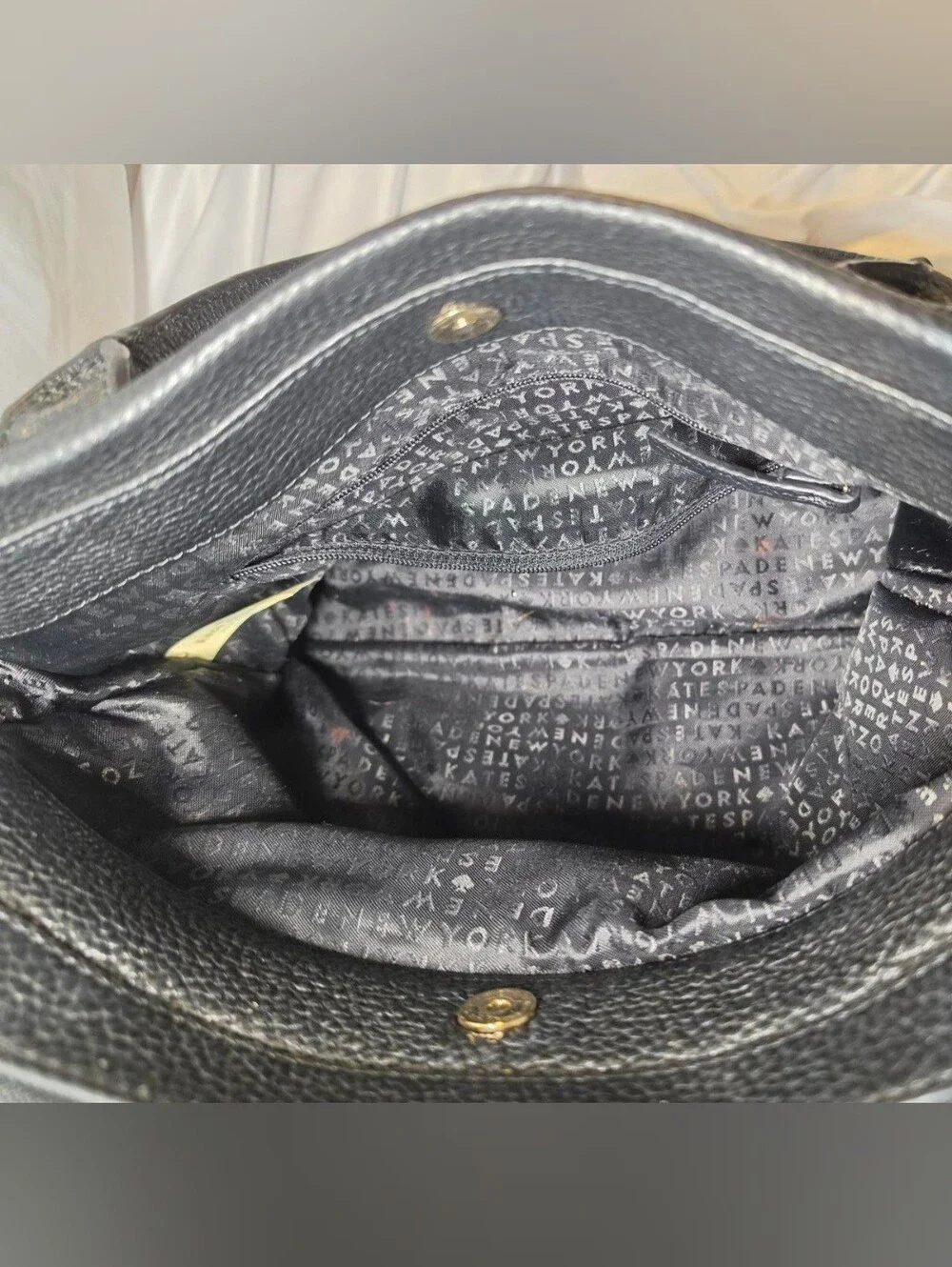 kate spade Black Pebbled Leather Satchel with Tassel Charm